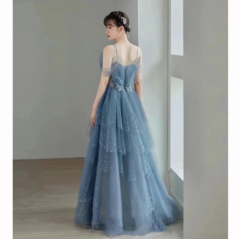 pantsparadises Blue Spaghetti Strap Evening Dress Luxury Tulle Applique Princess Cake   Gown Sexy Illusion Backless Long Quinceanera Dresses